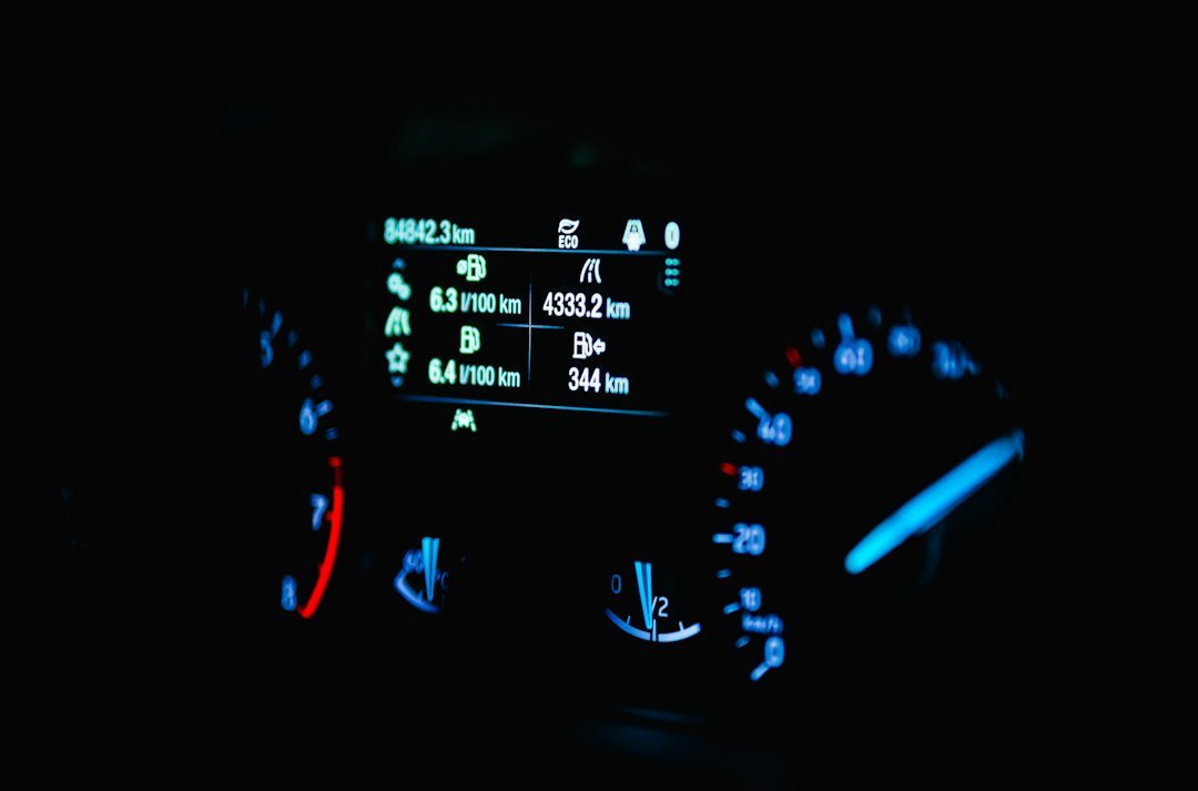 The dashboard of a car in the dark